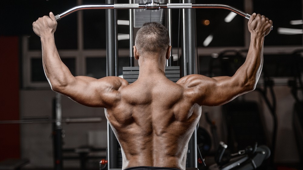 Hur man använder Lat Pulldown och Low Row Machine