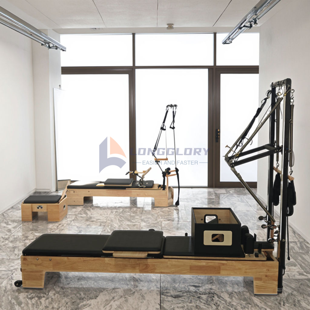 Ek trä pilates maskin med torn